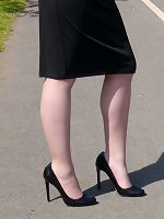 Traditional English Milf Jenny is wearing a sexy black dress and matching tall black high heels